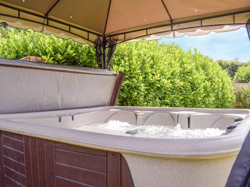 Hot tub | Hill View Lodge - Mill Farm Holiday Cottages, Heyope, near Knighton