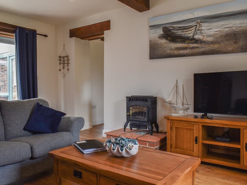 Living room | The Old Paybarn - Park Farm Barns, Snettisham