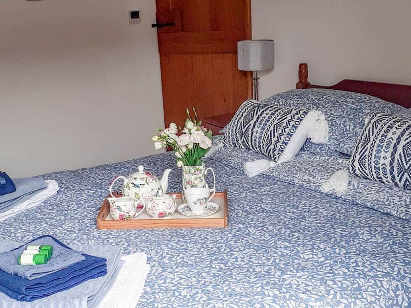 Sumptuous double bedroom | Meadow Barn, East Burton, near Wool