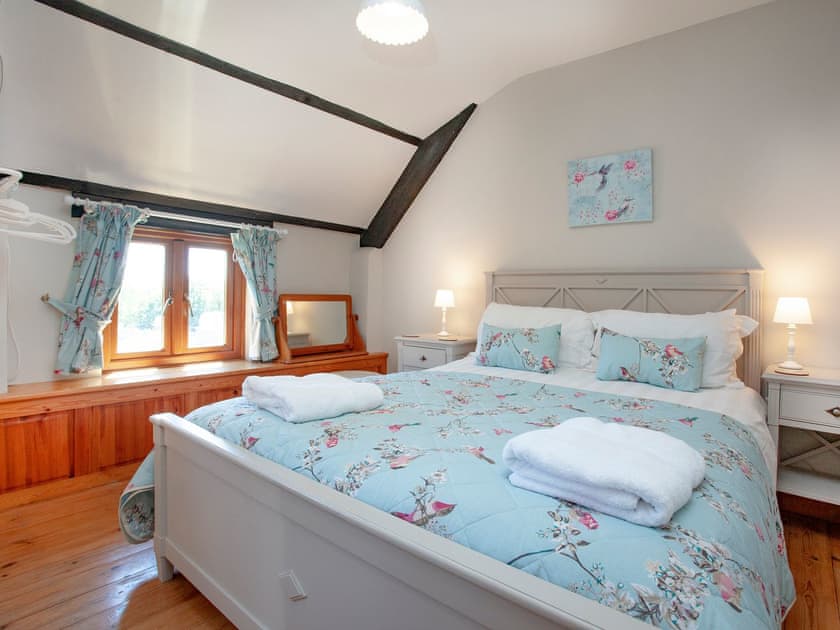 Double bedroom with King size bed  | Four Seasons Cottage, Torrington