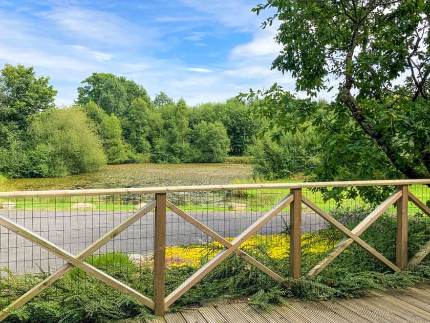 Decking view | Lakeside Lodge, near Rhayader