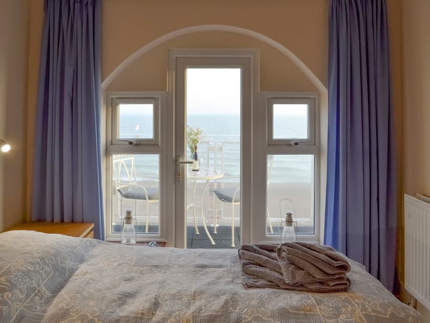 Double bedroom with balcony access | Coast Lodge, Pevensey Bay