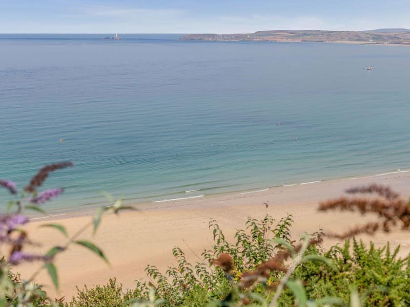 Views of Gwithian beach with lighthouse | Studio Sea Urchin, Carbis Bay, near St Ives