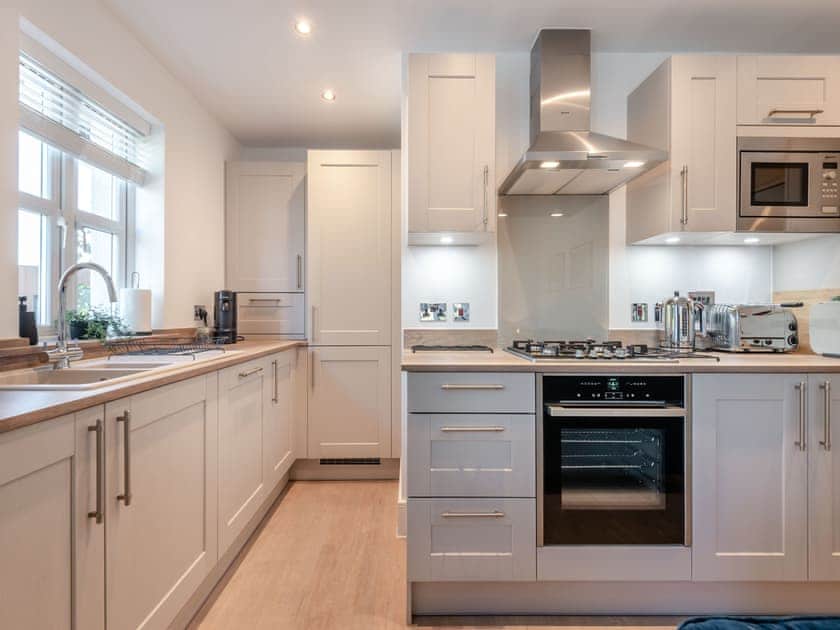 Kitchen area with integrated dishwasher/fridge/freezer/microwave  | Forest Acorn, Brockenhurst