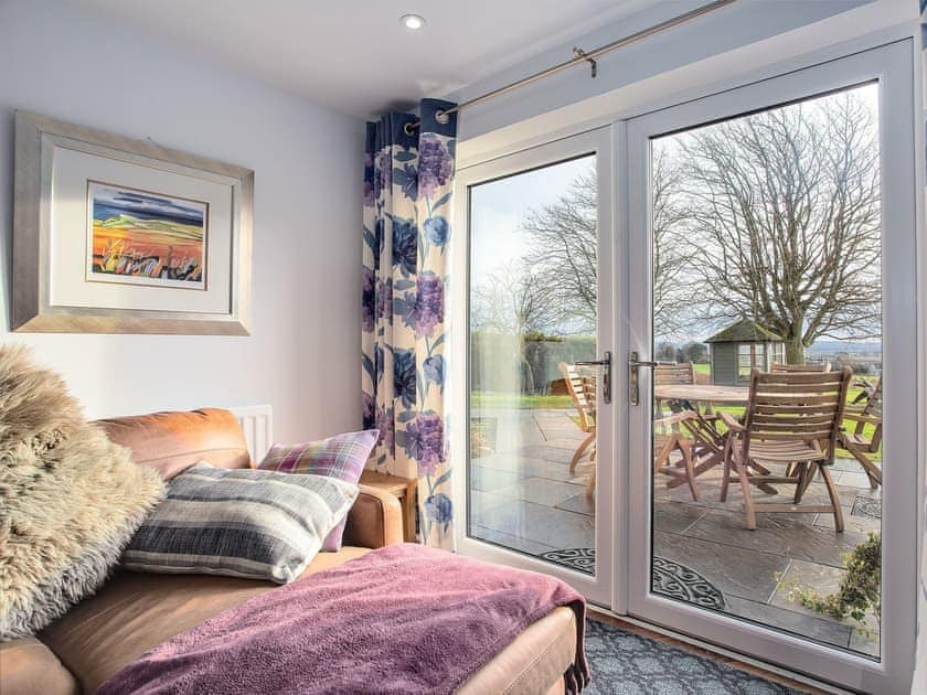 French doors leading to the patio | Fieldview - Blinkbonny Cottages, Auchtermuchty