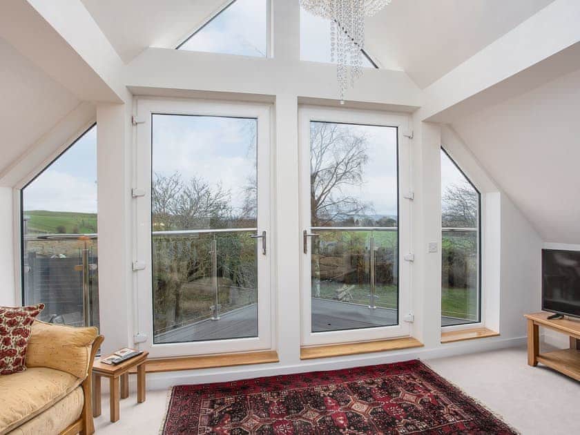Doors to the balcony | Orchard House - Blinkbonny Cottages, Auchtermuchty