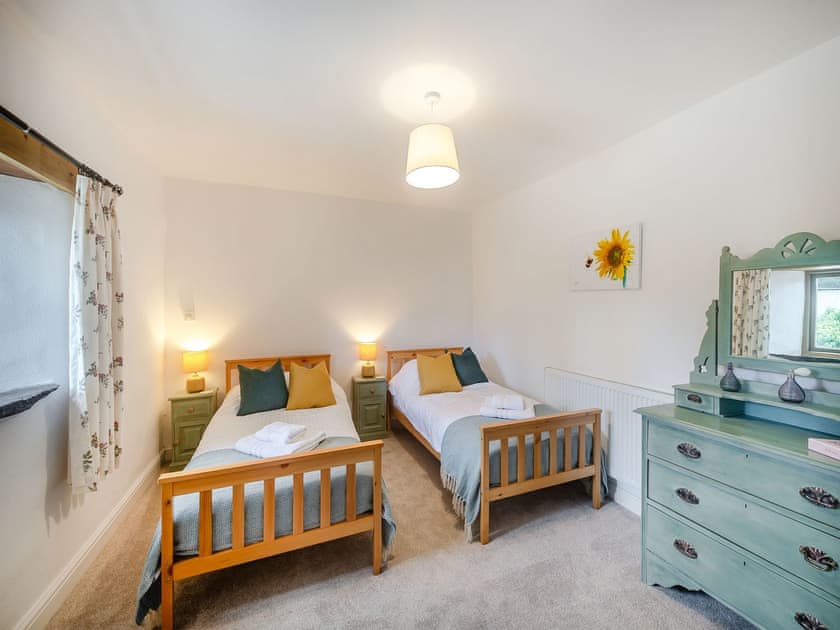 Twin bedroom | Woodbury Farm, Dartmouth