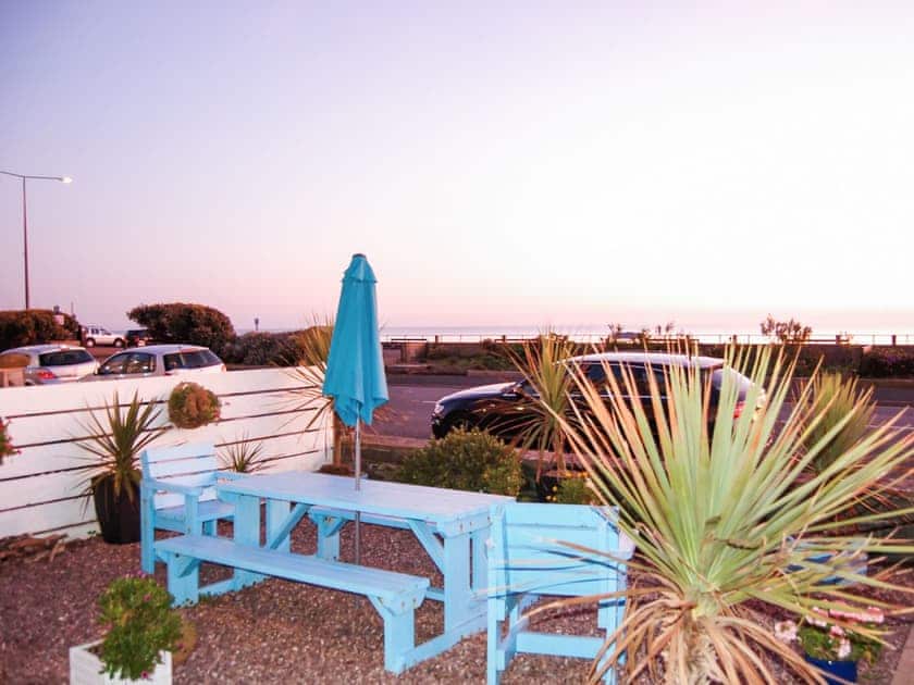 Sitting-out-area | Beach Front Apartment, Tywyn