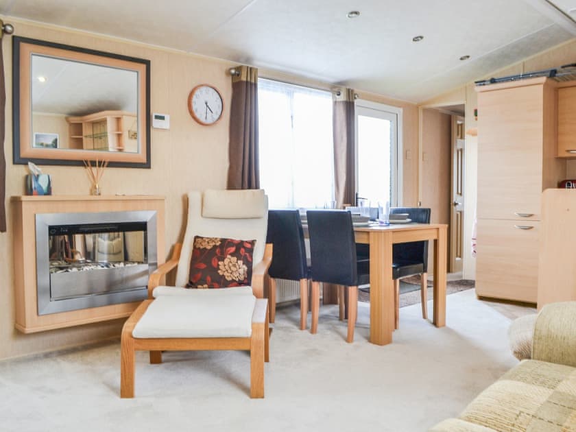 Living room/dining room | Forest Views Caravan Park- Ruan’s Roost - Forest Views Caravan Park, Moota, near Cockermouth