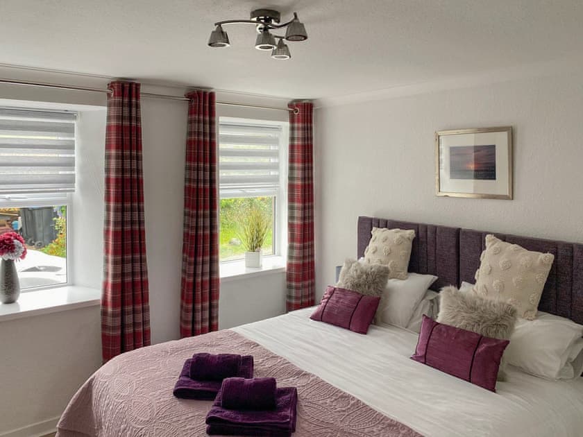 Downstairs bedroom set as a king size bedroom | Holly Cottage, Palnackie, near Castle Douglas