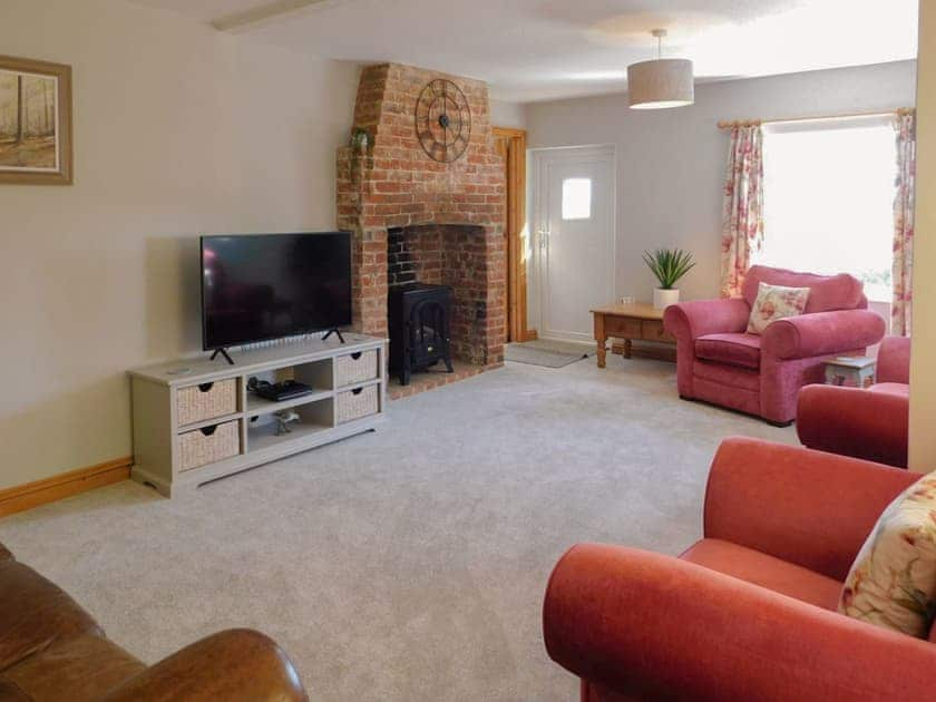 Living room | Flint Cottage - Dairy Farm Cottages, West Caister