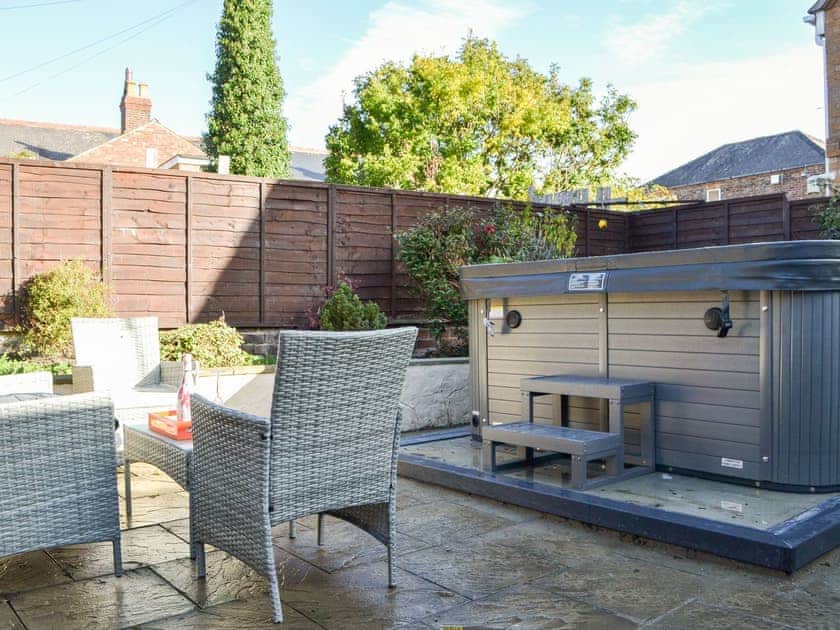 Outdoor area with hot tub | Kilburn House, Bridlington