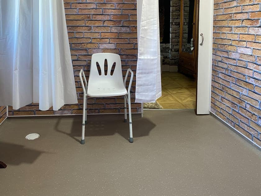 Downstairs en-suite bathroom. Wheelchair accessible. High rise toilet. | St Blanes House, Kilchattan Bay, near Rothesay, Isle of Bute