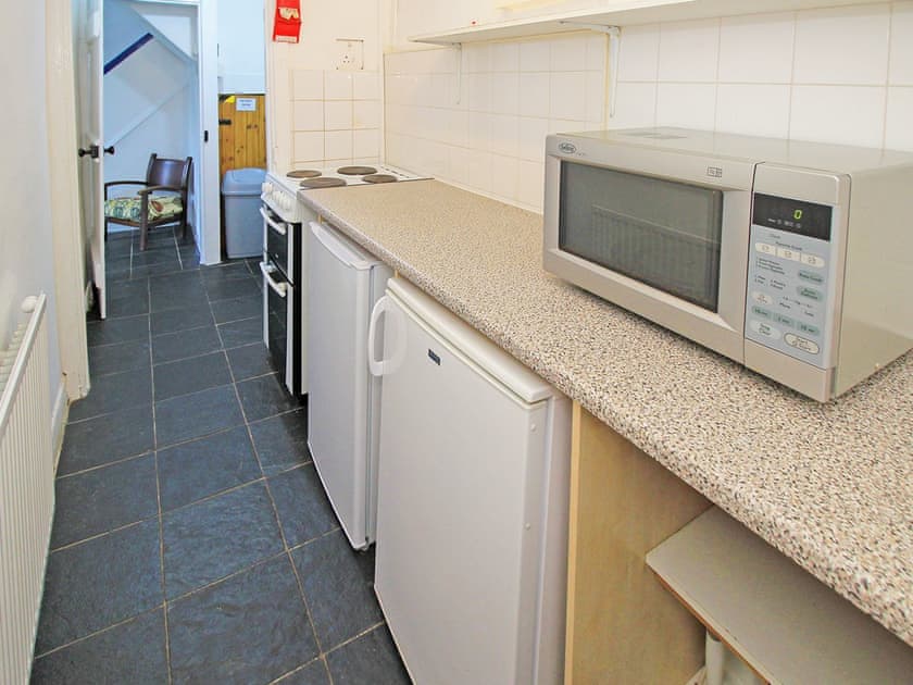 Kitchen (lower ground floor level) | Former Farmhouse, Llanbedr