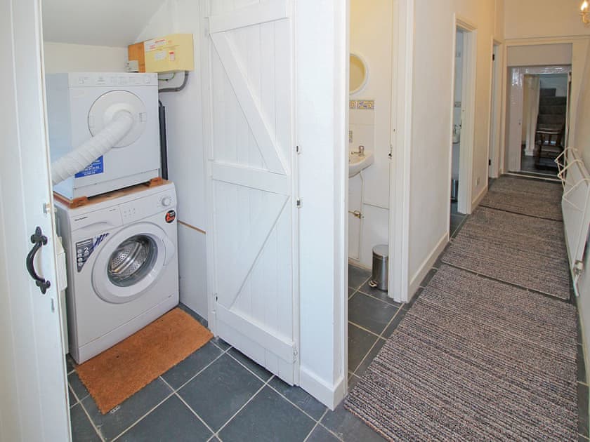 Utility cupboard (upper ground floor level) | Former Farmhouse, Llanbedr