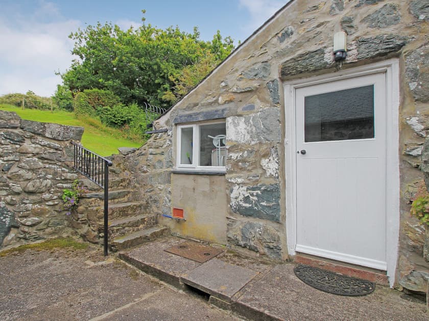 Back Door showing steps up to the shared back garden  | Former Farmhouse, Llanbedr