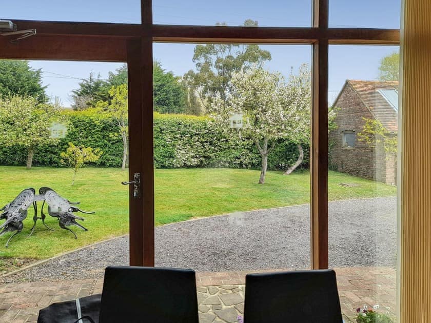 Looking out to the garden | Chilsham Barn, Herstmonceux, near Hailsham