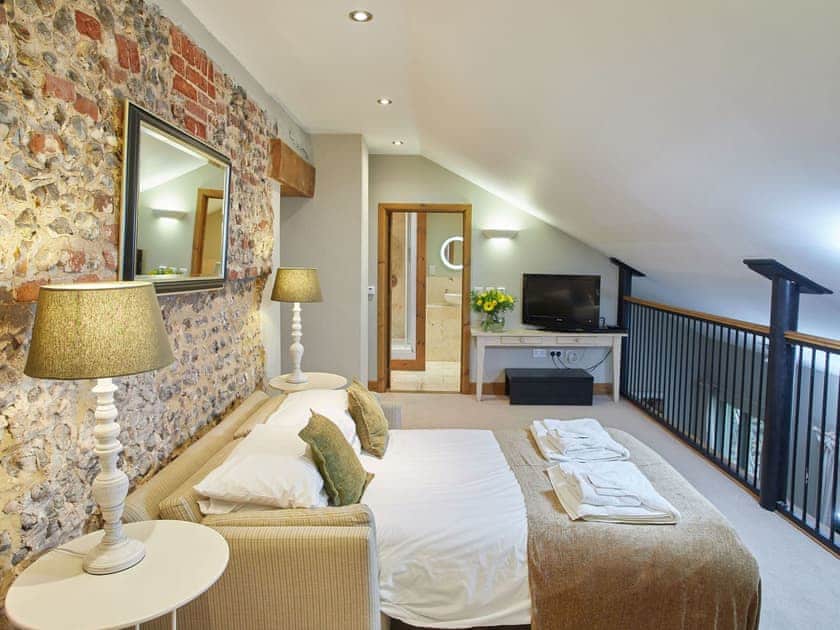 Galleried landing with sofa bed made up  | The Strawhouse - Manor Mews, Tattersett, near Fakenham