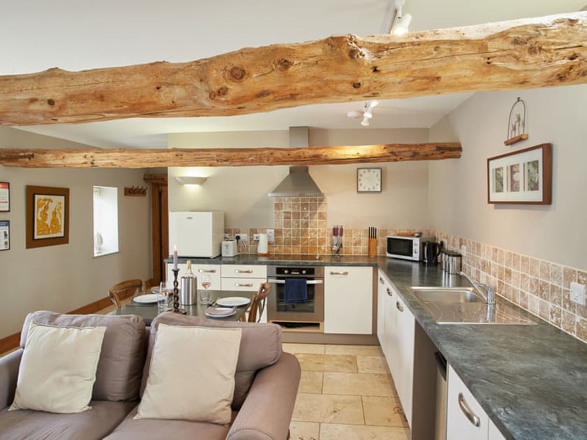 Open plan living space with marble floor | The Old Feedhouse - Manor Mews, Tattersett, near Fakenham