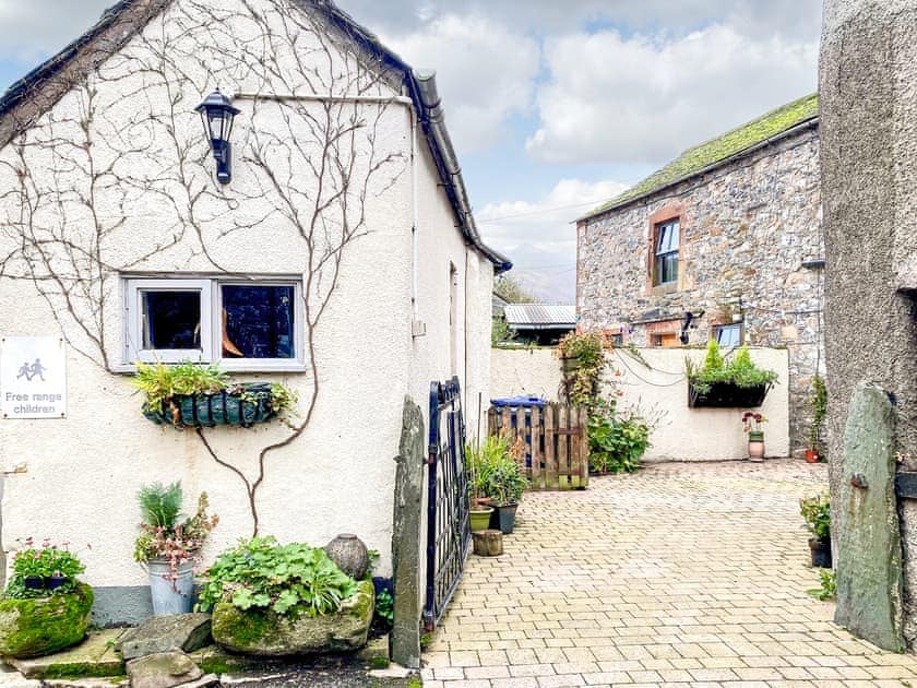 Yard entrance. Brook House 2 is round the corner out of view. | Brook House 2 - Brook House Cottage Holidays, Bassenthwaite