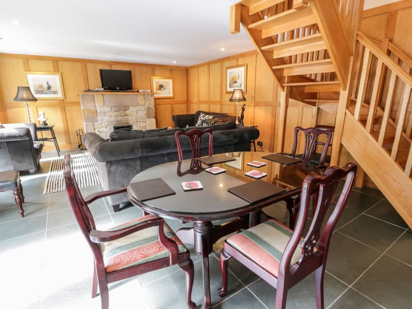 Open plan living space | Coach House - Cloncaird Castle, Kirkmichael, near Ayr