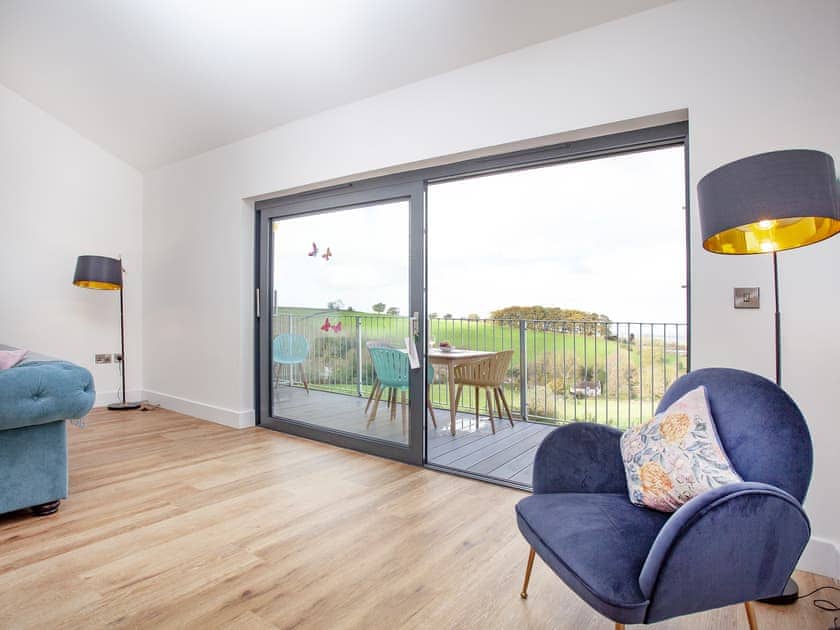 Living area | Primrose - Bincombe Country Cottages, Over Stowey, near Bridgwater