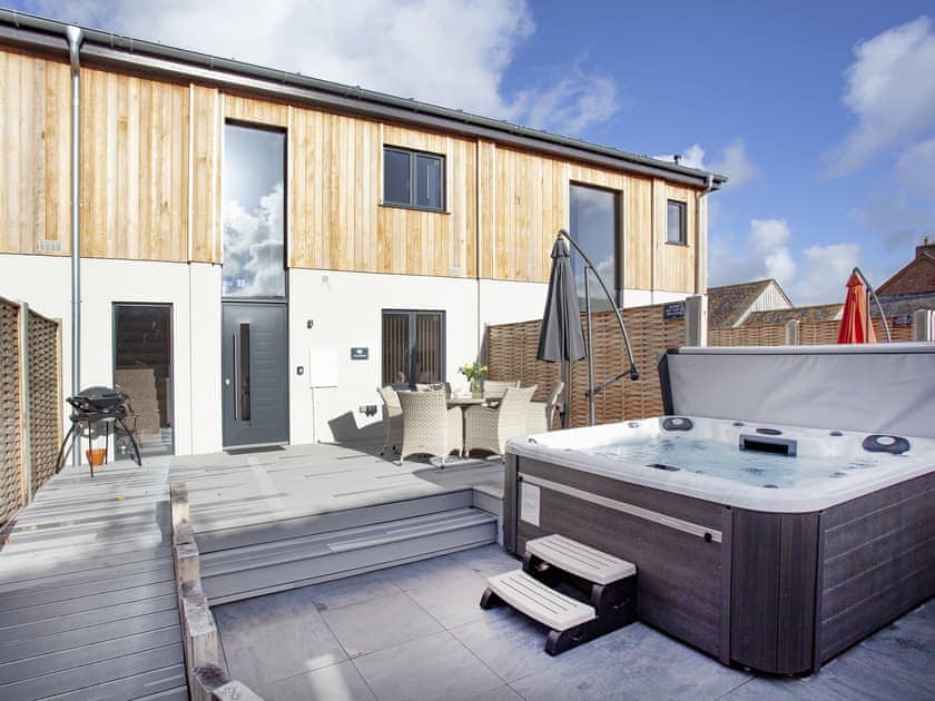 Hot tub | Primrose - Bincombe Country Cottages, Over Stowey, near Bridgwater