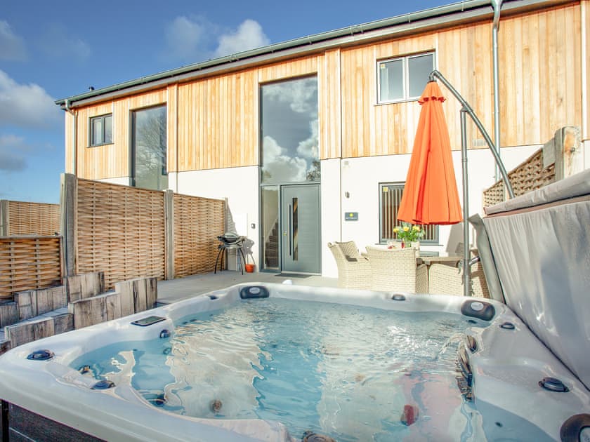 Hot tub | Buttercup - Bincombe Country Cottages, Over Stowey, near Bridgwater