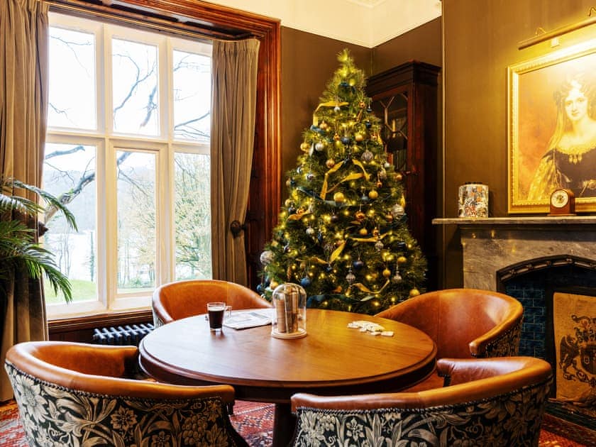 Christmas decor in the library | Fallbarrow Hall, Bowness-On-Windermere