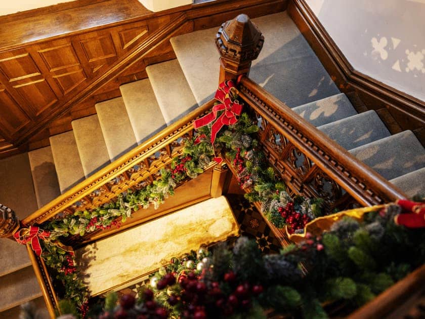 Christmas decor on the staircase | Fallbarrow Hall, Bowness-On-Windermere