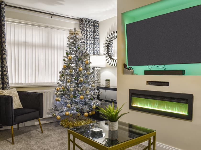 Living room decorated for Christmas | Wharfdale Lodge, Thornton-Cleveleys, near Blackpool