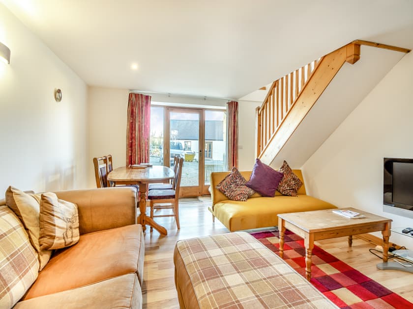 Living room/dining room | Beudy Bach - Ffrwdwenith Isaf Farm and Cottages, Felinwynt