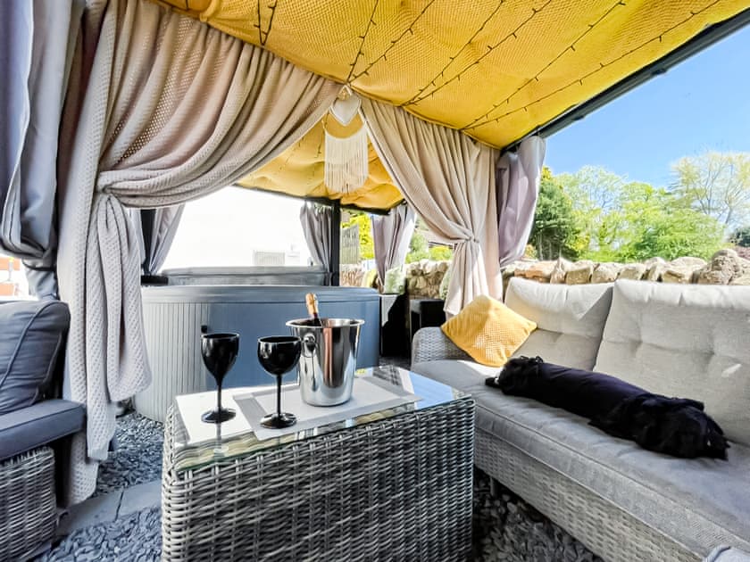 Outdoor living area with hot tub  | Cherry Cottage, Little Salkeld, near Penrith