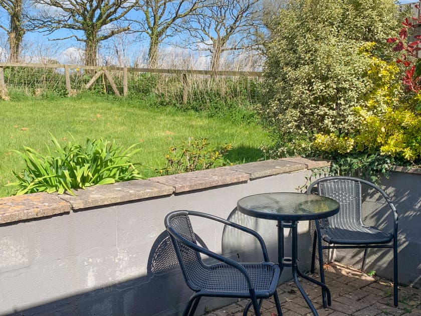 Patio | Bay Tree Cottage - Legge Farm Cottages, Highhampton, near Beaworthy