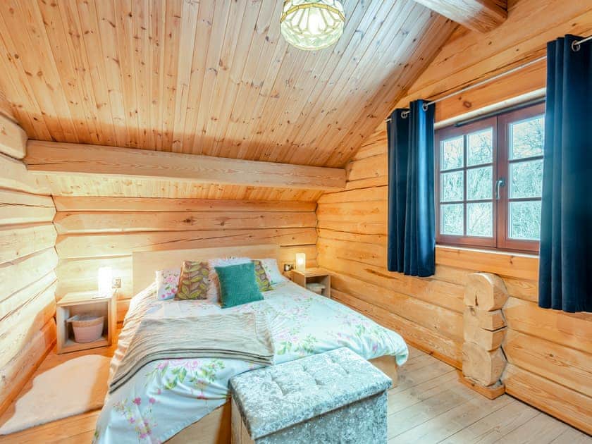First floor king bedroom | Ty Afal - Dwr Y Felin Log Cabins, Carno