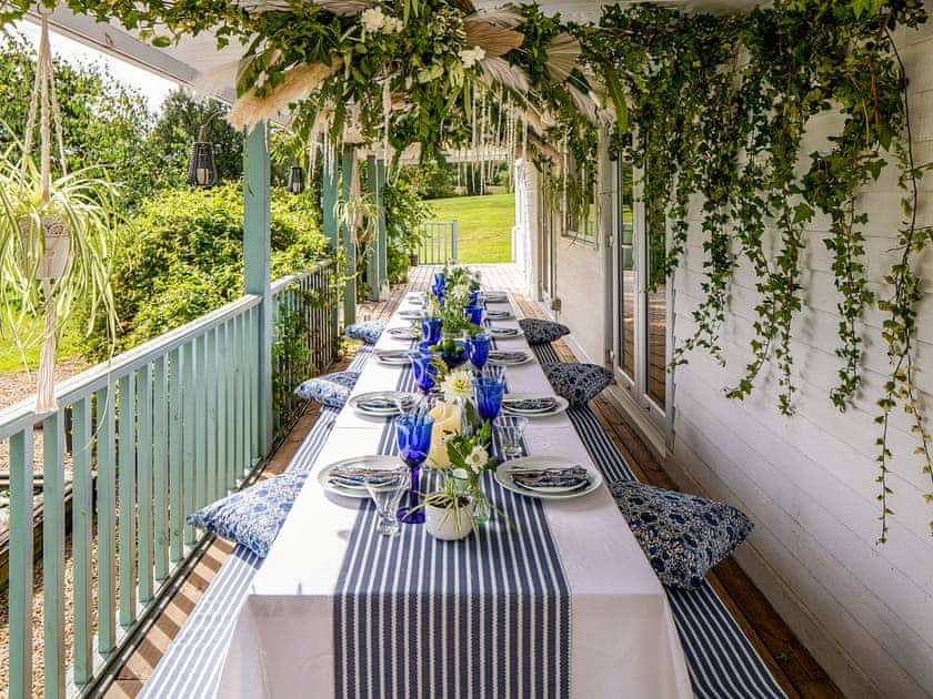 Sitting-out-area | The Lodge - Marshwood Manor Cottages, Bettiscombe, near Lyme Regis