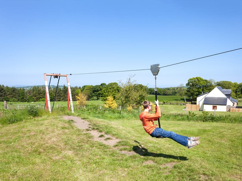 Children’s play area | Appletree Cottage - Williamscraig Holiday Cottages, Linlithgow