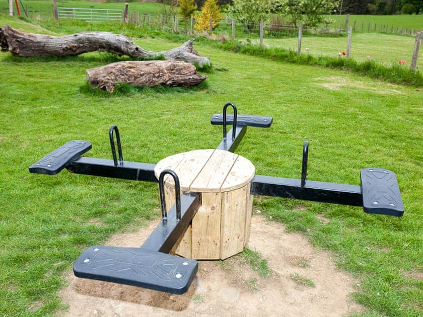Children’s play area | Beech Cottage - Williamscraig Holiday Cottages, Linlithgow