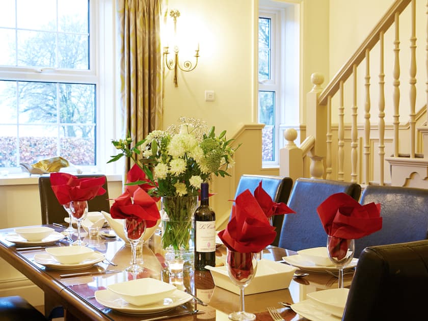 Elegant dining room with stairs to first floor | The Hind House, Cottam, near Driffield