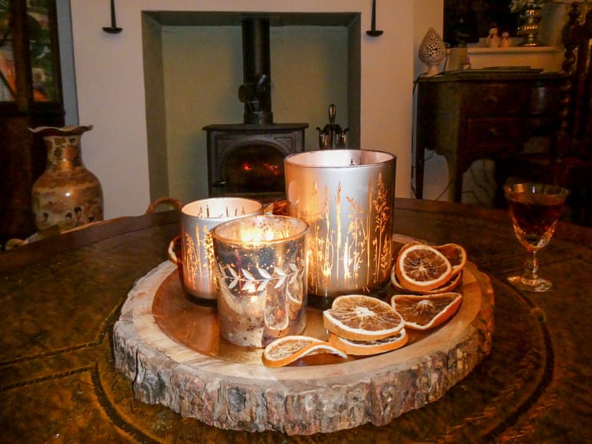 Candles and Log burner in the snug | Willowfield Cottage, Thornton-Le-Dale
