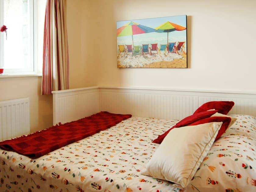 Downstairs bedroom with sofa bed | Sunset Bay Designer Beach House, Tywyn