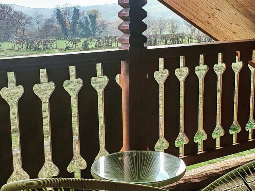 Balcony with farmland views  | Ty Afal - Dwr Y Felin Log Cabins, Carno
