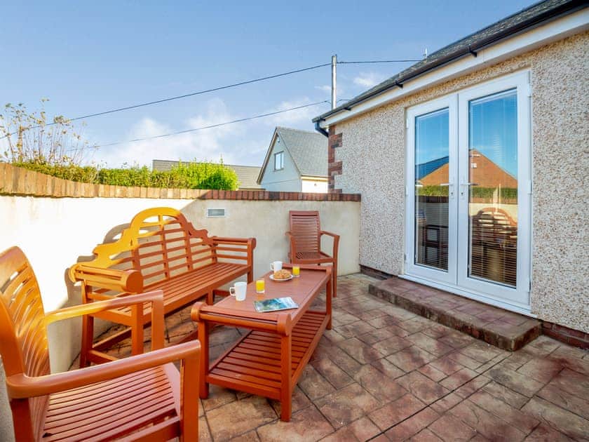 Outdoor area | Pwyll Cottage - Bryn Awel Caravan Park, Pentraeth