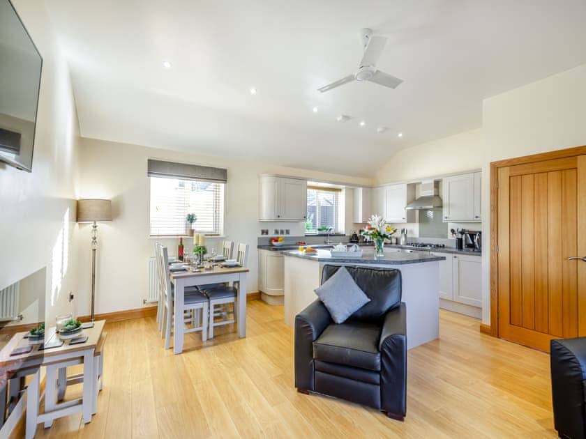 Open plan living space | Pwyll Cottage - Bryn Awel Caravan Park, Pentraeth