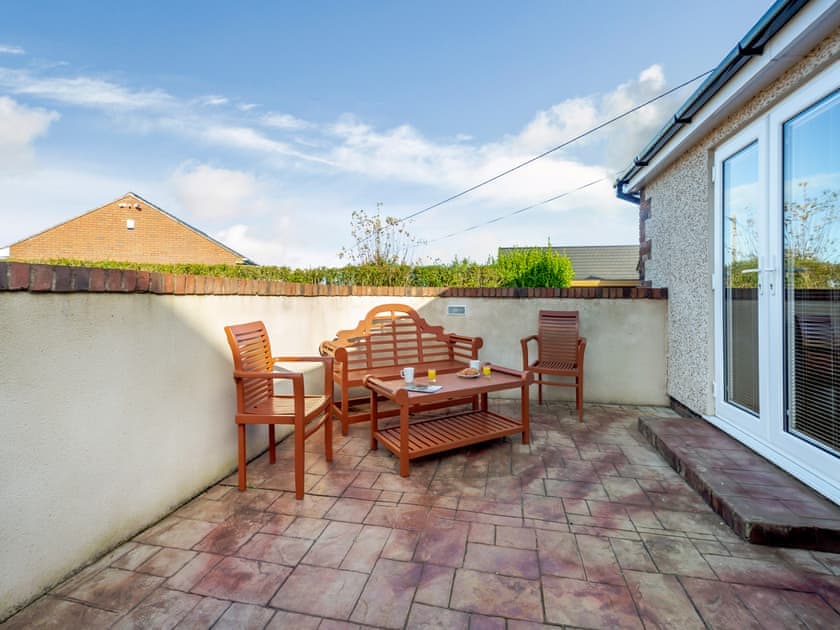 Outdoor area | Pwyll Cottage - Bryn Awel Caravan Park, Pentraeth