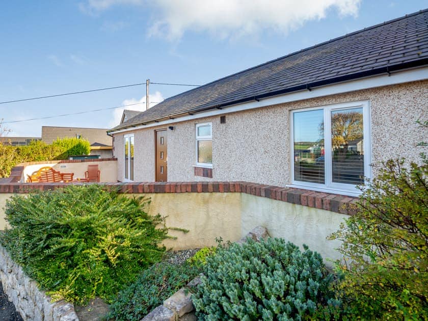 Outdoor area | Pwyll Cottage - Bryn Awel Caravan Park, Pentraeth