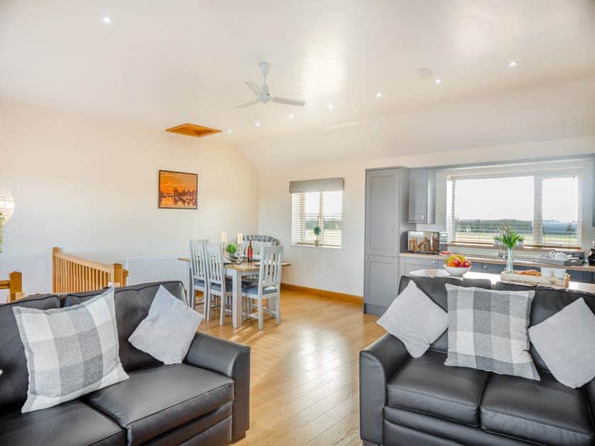 Open plan living space | Manawydan Cottage - Bryn Awel Caravan Park, Pentraeth