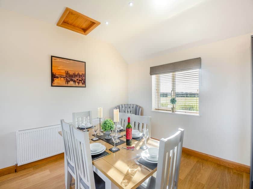 Open plan living space | Manawydan Cottage - Bryn Awel Caravan Park, Pentraeth
