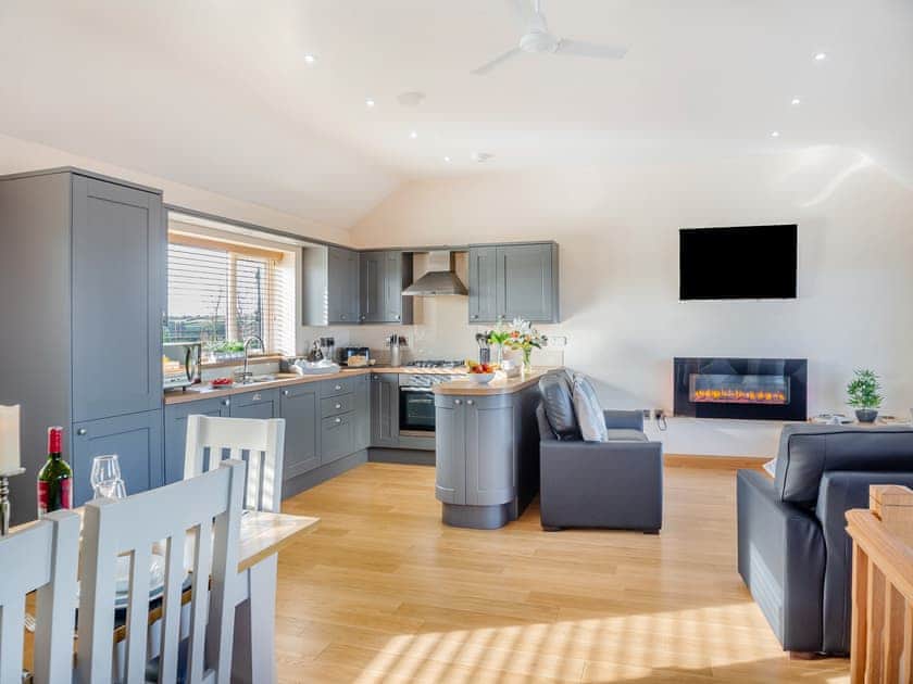 Open plan living space | Manawydan Cottage - Bryn Awel Caravan Park, Pentraeth
