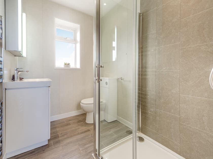Shower room | Math Cottage - Bryn Awel Caravan Park, Pentraeth